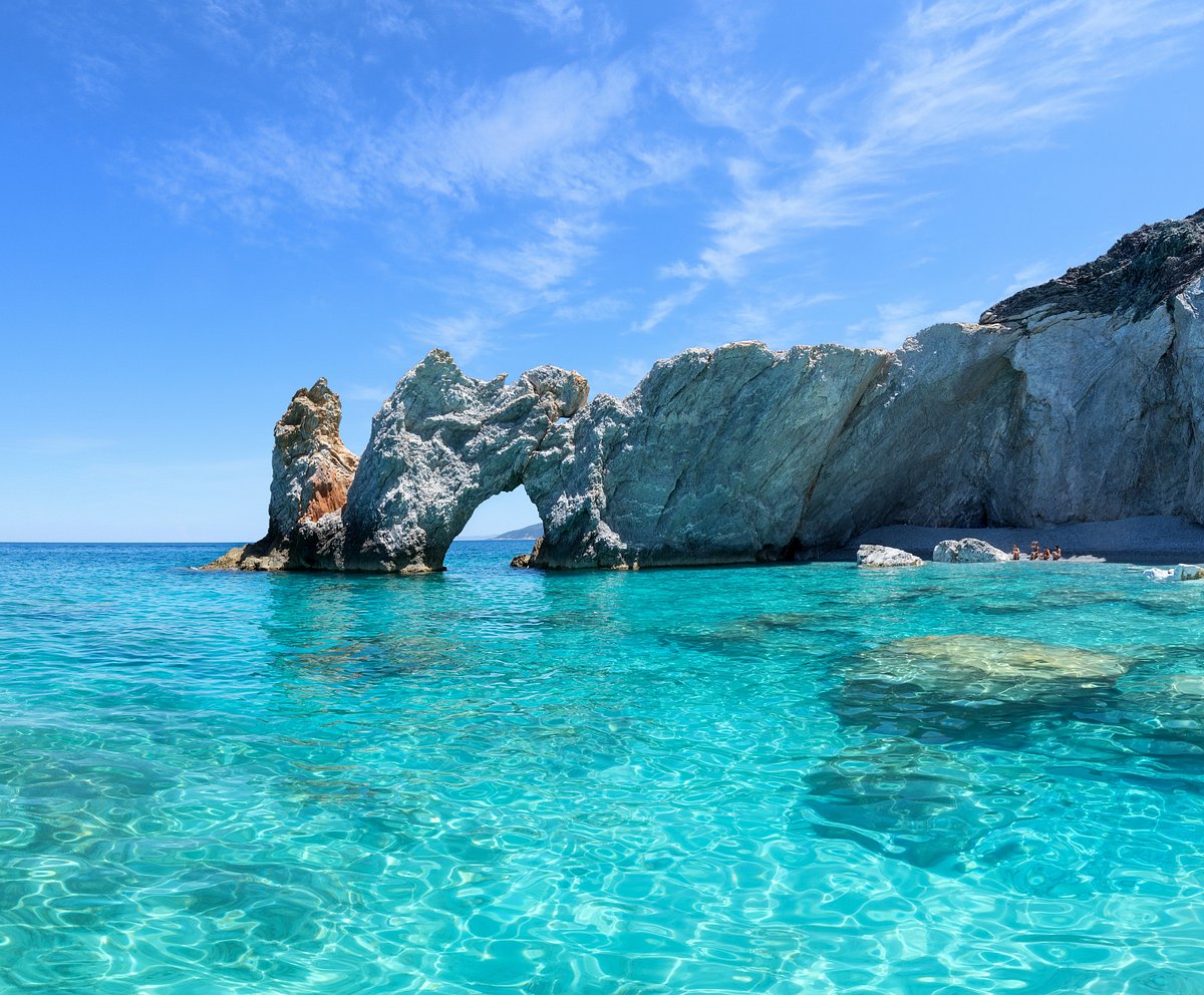 Visit Lalaria Beach by boat and discover one of the most iconic beaches in Skiathos, famous for its white pebbles and turquoise waters.