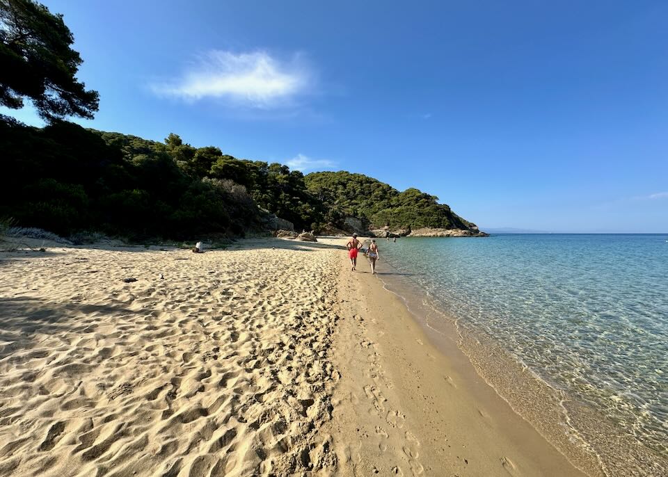 Discover the best things to do in Skiathos by boat, from Lalaria Beach and Blue Caves to Tsougria Island and hidden coves.